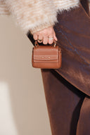 Bolso mini charm Rialto en cuero de vacuno napa de primera calidad