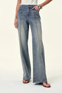 Jeans de pierna ancha Calli con tachuelas en denim de algodón