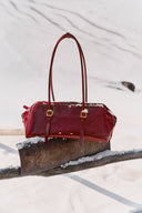 Sac bandoulière Monti East West en cuir pleine fleur huilé ciré