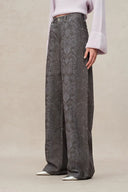 Jeans Antonia con estampado de escamas de serpiente en denim de algodón lavado