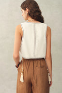Top gilet Charlie Boho con nappine laterali e perle di madreperla, in denim di cotone