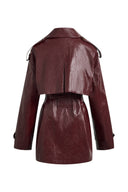 Manteau style trench Ostro en cuir synthétique ciré
