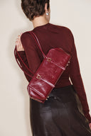 Sac bandoulière Monti East West en cuir pleine fleur huilé ciré