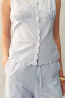 Top sin mangas con encaje, bordado a rayas y diseño Lone en algodón arrugado