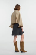 Earth tone cotton-blend cropped jacket with wide sleeves and exposed stitching, back view on model.