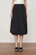 Cathy Black Twisted-Seam Bubble Midi Skirt in Lightweigt Blend