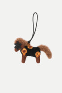 Charm para bolso Pegasus con flor de crochet