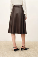 Anya Buckle Detail Pleated Midi Skirt in Vegan Leather