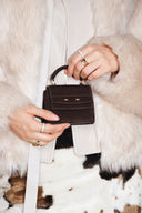 Mini borsa charm Rialto in pelle di vitello opaca top-grain