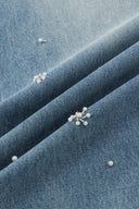 Jean Nico orné cousu main en denim léger lavé