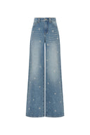 Jean Nico orné cousu main en denim léger lavé