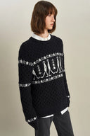 Star Walker Pull Fair Isle noir en laine tricotée avec fil à pompons