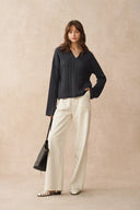 Maglione spesso Miko in lana Merino lavorata a trecce