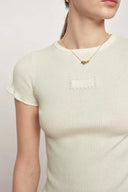 T-shirt sculpté blanc Linnea à volants en coton et maille de laine