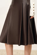 Anya Buckle Detail Pleated Midi Skirt in Vegan Leather