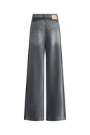 Jeans Holgados Clarisse en Tonos Oscuros en Denim de Algodón