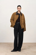 Chaqueta de plumón con cuello desmontable de cuero sintético en pana de algodón