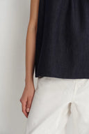 Top gilet senza maniche Kyra e completo skort in lyocell denim