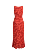 Red sleeveless dress in light crinkle gauze with subtle floral pattern, back view on white background