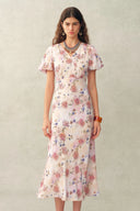 Coco handbemaltes Kleid mit Blumenmuster, Puffärmeln und Taillierung aus Crinkle-Gaze