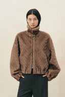 Greta Vintage Cropped-Jacke mit Fischgrätmuster aus Kunstnerzpelz