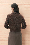 Back view of a brown cropped wool blend cardigan with textured knit detail