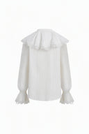 White designer blouse with lace bib collar, pleated front, puff sleeves and delicate lace cuffs