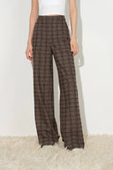 Women's brown plaid wool blend pants with a tailored high waist and cinched ankle cuffs