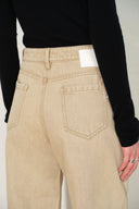 Womens khaki washed cotton denim jeans with curved back pockets and elongated straight legs
