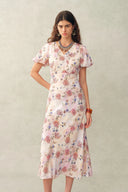Coco handbemaltes Kleid mit Blumenmuster, Puffärmeln und Taillierung aus Crinkle-Gaze