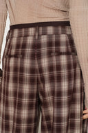 Plaid wide leg pants with a layered double waistband and tailored front pockets