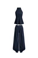Navy pleated halter top with matching wide leg jeans set in denim