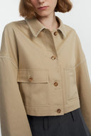 Earth tone cotton-blend jacket with contrast stitching, patch pockets, and button front, front view cropped on model.