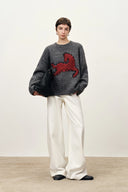 Pull Quella rouge à épaules tombantes en maille alpaga laine