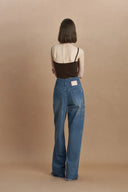 Jean taille haute à ourlet effiloché Vega en denim de coton délavé