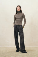Women's plaid flannel wide leg pants with a relaxed drawstring waist