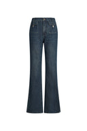 Women's flare jeans in washed cotton denim with buckled flap pockets and slit hems