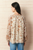 Blusa Vila con maniche a sbuffo floreale ispirata alla Persia in misto cupro