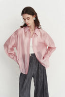 Chemise boutonnée transparente rose Bella en organza