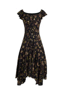 Black viscose dress with handpainted floral print, off-shoulder ruffled neckline, and cascading front ruffle, front view.
