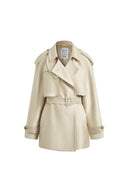 Champagne oversized cropped trench coat with belted waist lapels epaulettes and cuff straps