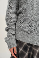 Maglione Clara con paillettes all'uncinetto e spalle scoperte regolabile in filato di alpaca con paillettes