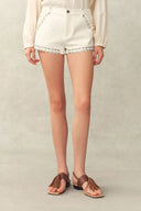 Cori Boho A-lijn shorts met parelmoer en studs in katoendenim