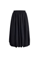 Black elasticated bubble midi skirt with gathered volume and sculptural shape