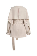 Beige cropped wool gabardine trench coat with cape back, belted waist and cuff straps