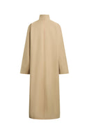 Back view of a beige wool blend long coat with high collar and relaxed silhouette