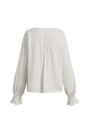 White crinkle cotton blouse with gathered yoke and tie cuffs