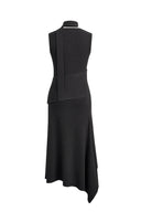 Black fitted knit dress with ribbed bodice and asymmetric draped hem