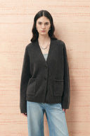 Deep grey wool alpaca blend cardigan with button front and patch pockets on a model