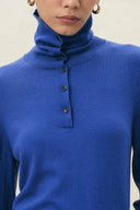 Sapphire blue wool blend knit top with cowl neck, button half placket and long sleeves